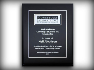 Black piano finish plaque with engraved metal plate and engraved logo plate